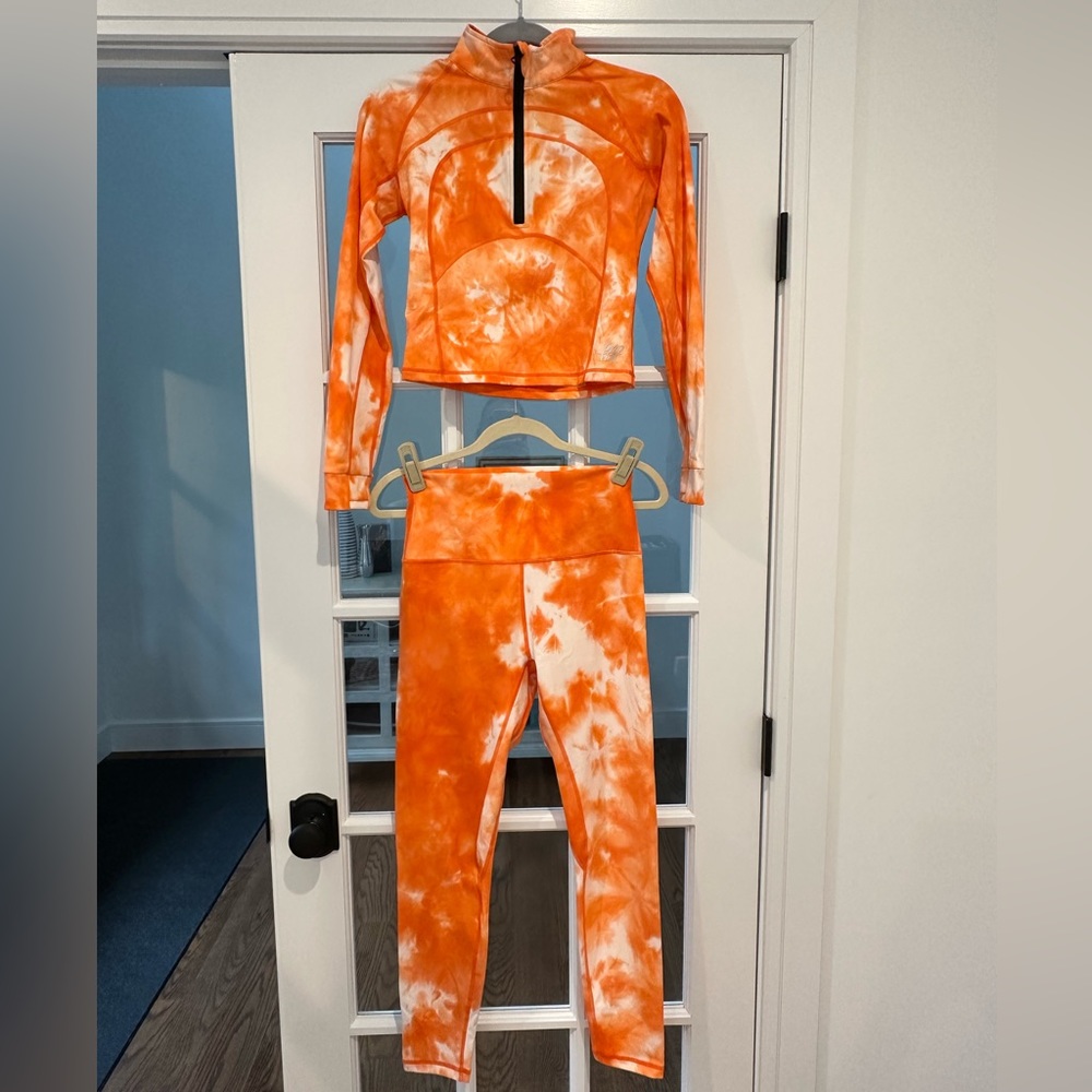 NWOT NEVER WORN FBF Body orange tie dye workout set size medium.